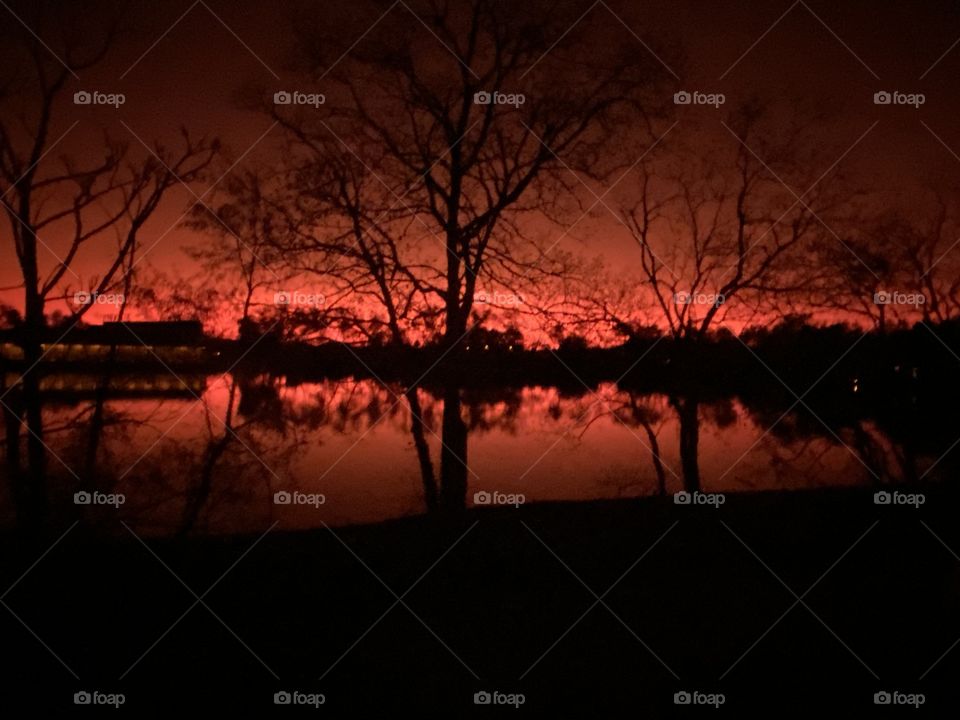 Beautiful setting well into Twilight backlit Reflections on Lake water cast Colours. 