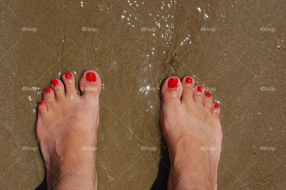 Pies y arena