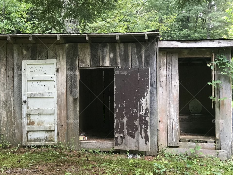 Stumbled upon these two rustic outhouses in vast disrepair in the woods on our off-road adventure. I am sure they have stories to tell...