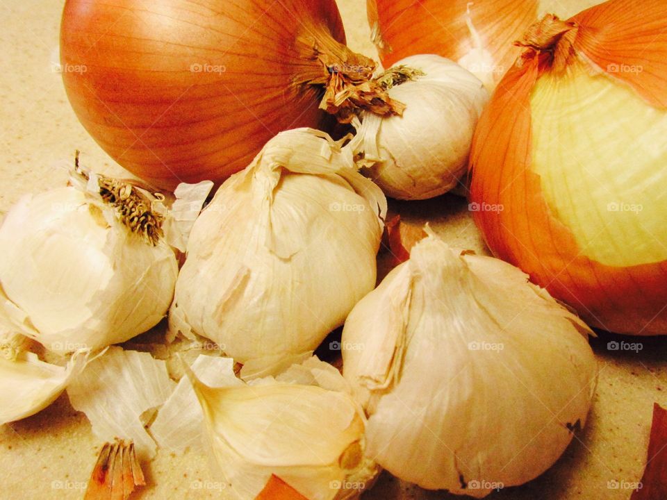 Full frame of garlic and onion