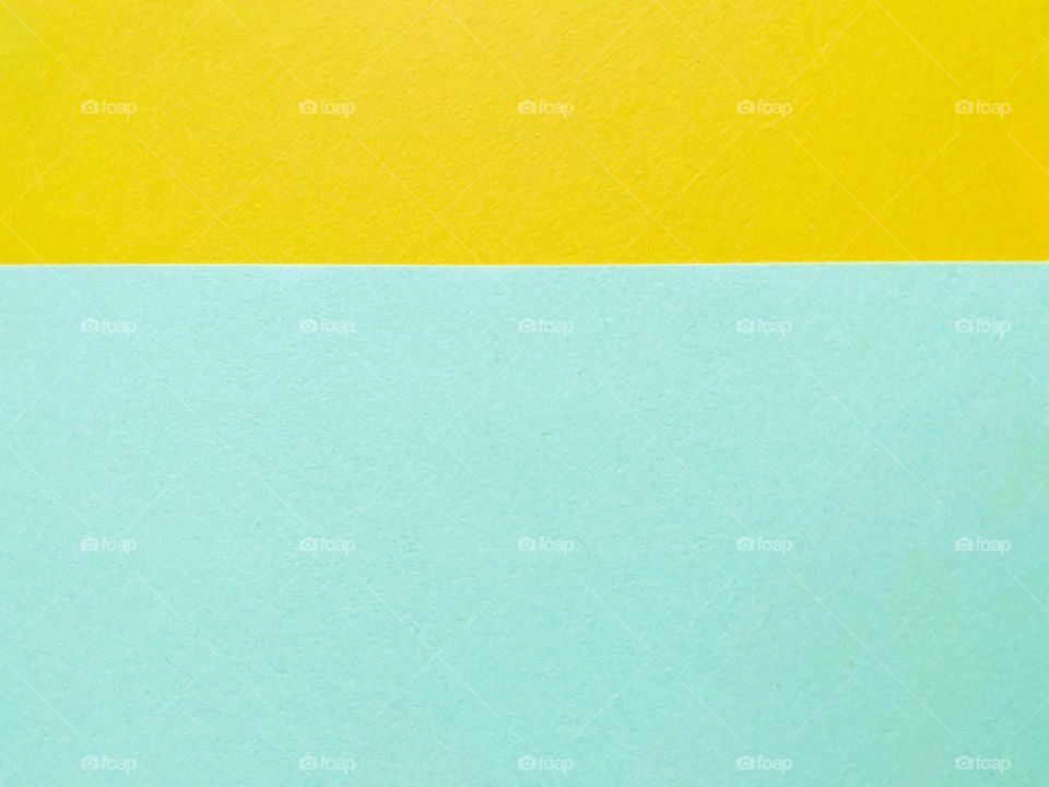 Full frame shot of green and yellow paper