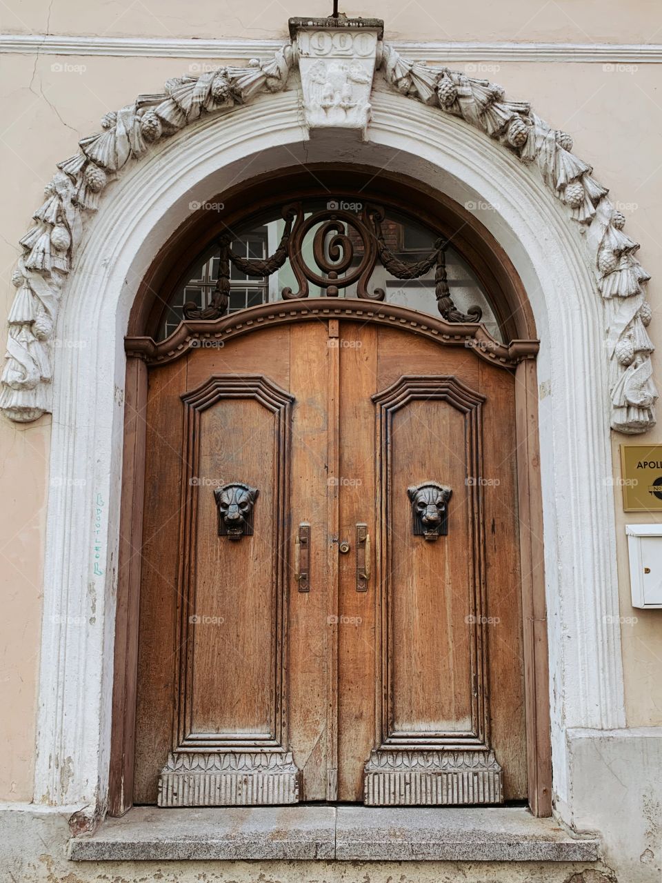 Amazing old door with metal cats. Old Tallinn 