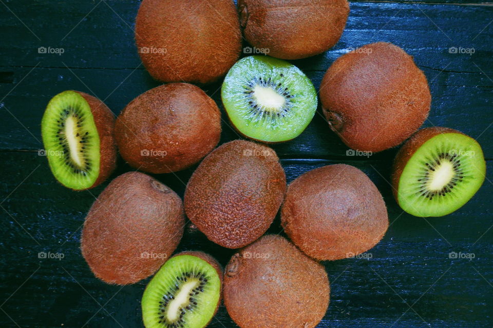 kiwi on a black background