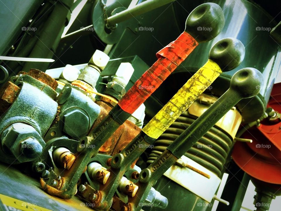 Handles on a truck red, yellow and black 