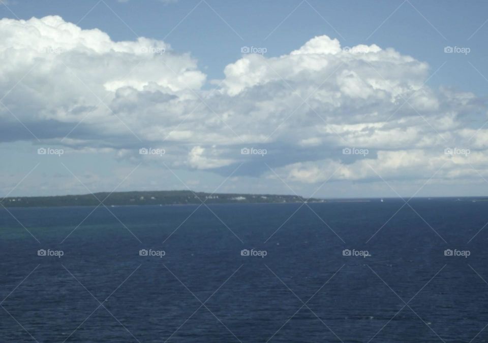 Clouds over lake Lake Huron near Mackinac Island