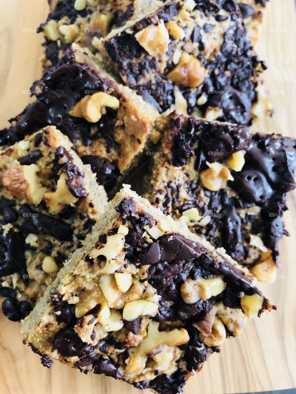 Snack time: Healthy no sugar Snicker bars including banana, dark chocolate, peanut butter and walnuts. Perfect bite!