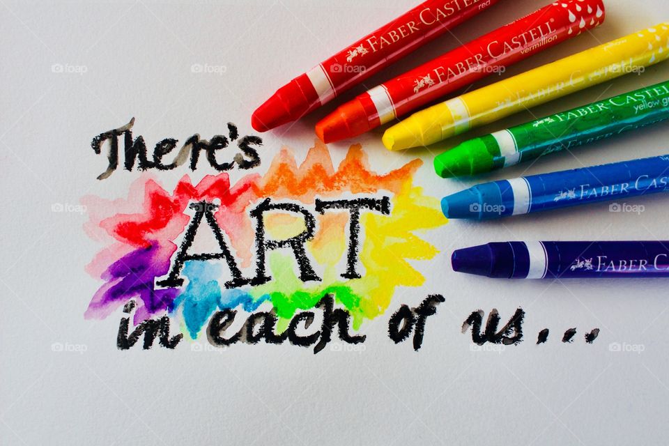 Colours of the World - watercolor crayons on mixed-media wire-bound paper next to watercolor-crayon-embellished phrase “There’s art in each of us...”