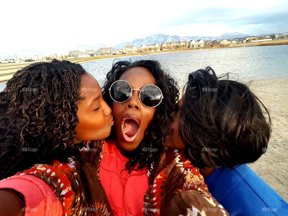 Three african girls taking selfie
