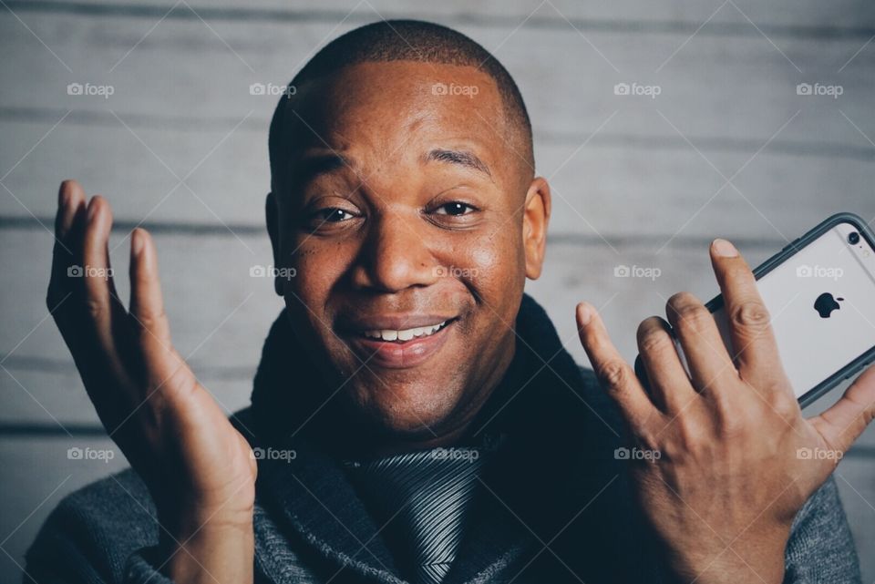 Young man smiling.  4/4 in a series. 