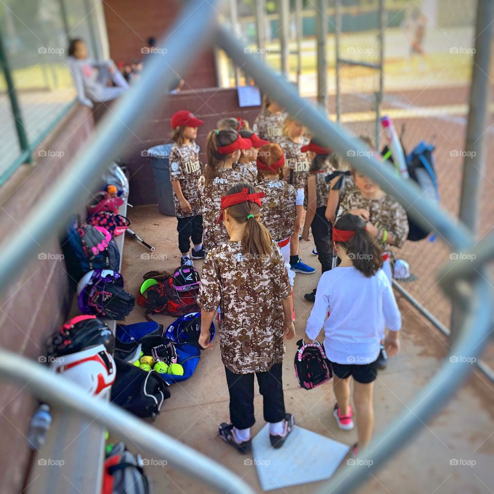 Softball team in the dugout