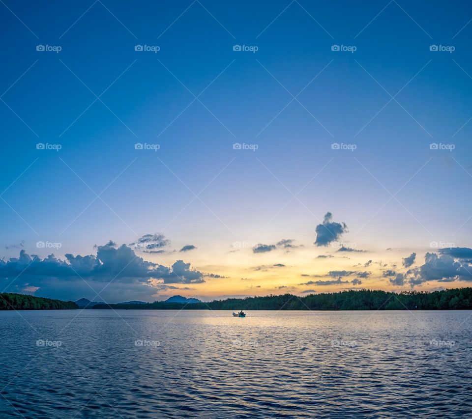 Boat and sea in sunset moment