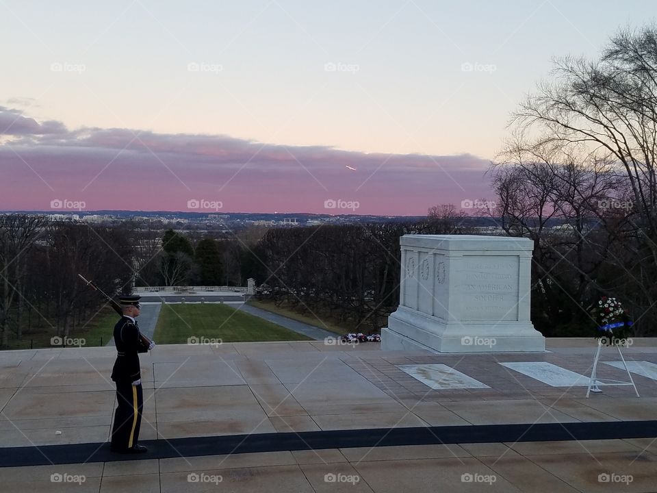 Brilliant colors in the sky over Arlington cemetery, DC in background