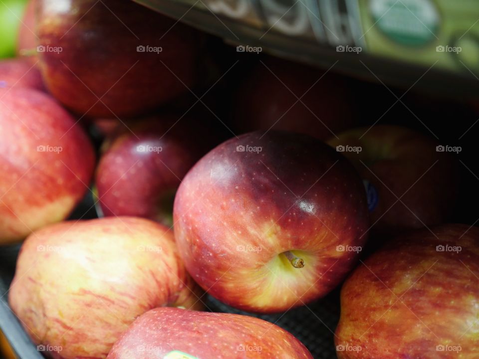 Red apples on shelve