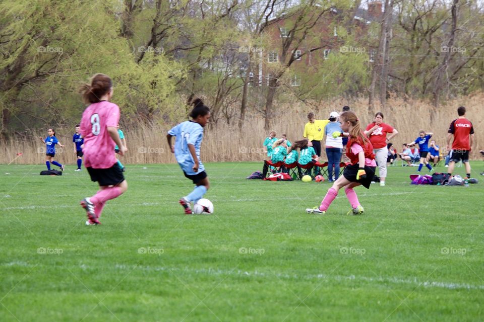 Girls playing soccer 