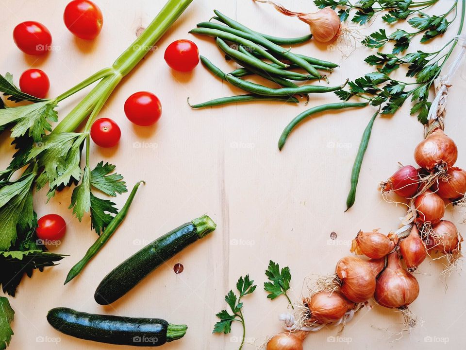 summer and fresh vegetables on the table in the kitchen