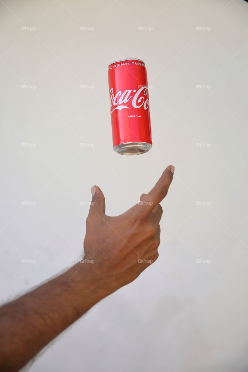 Catch that can of Coca-Cola