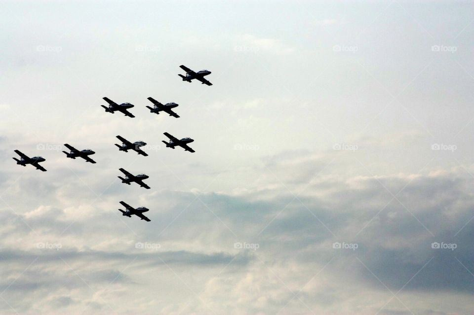 Nine airplanes flying in formation - Frecce Tricolori: Italian Air Force