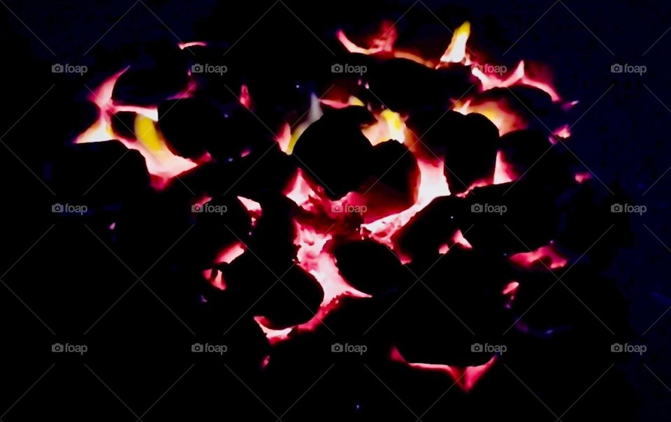 It’s the aftermath of the “New Years 2023” celebration & fireworks in Bavaria. Arranged into the shape of a beating heart the remaining coals of the bonfire in the fire bowl fuel the residual flames just enough to keep it going. Hypnotic Productions