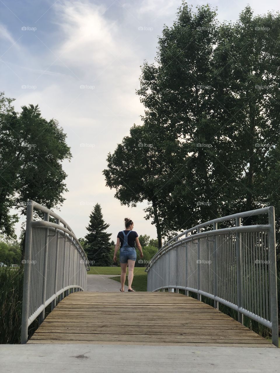 Original photo of the most amazing person in the world #my mom talking steps across the bridge enjoying the summer breeze 