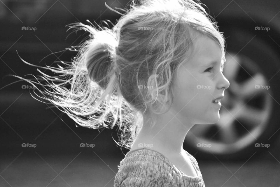 beautiful girl with sunlight in the hair