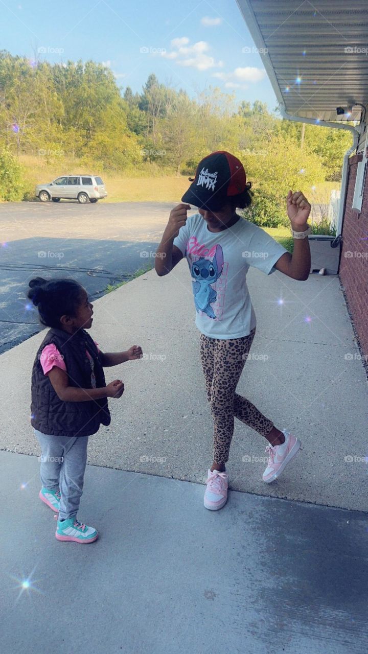 Big sister teaching little sister smooth moves. 😁