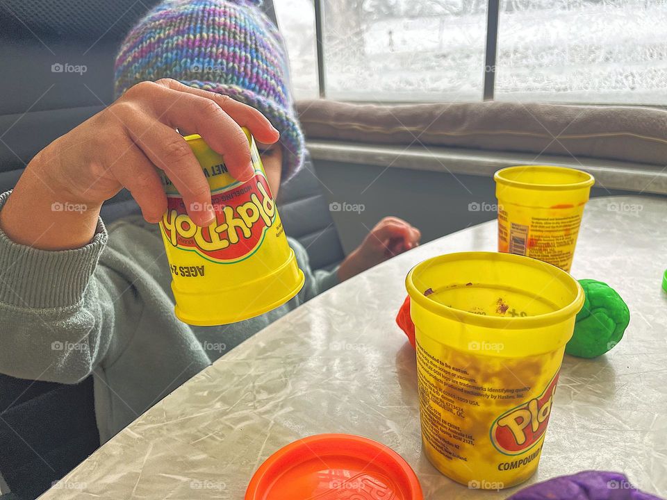 Child playing with playdoh, playing inside on a cold and snowy day, snow day fun, playing with playdoh, toddler playing inside, occupying a toddler on a cold day, having fun inside, subzero temperatures activities 