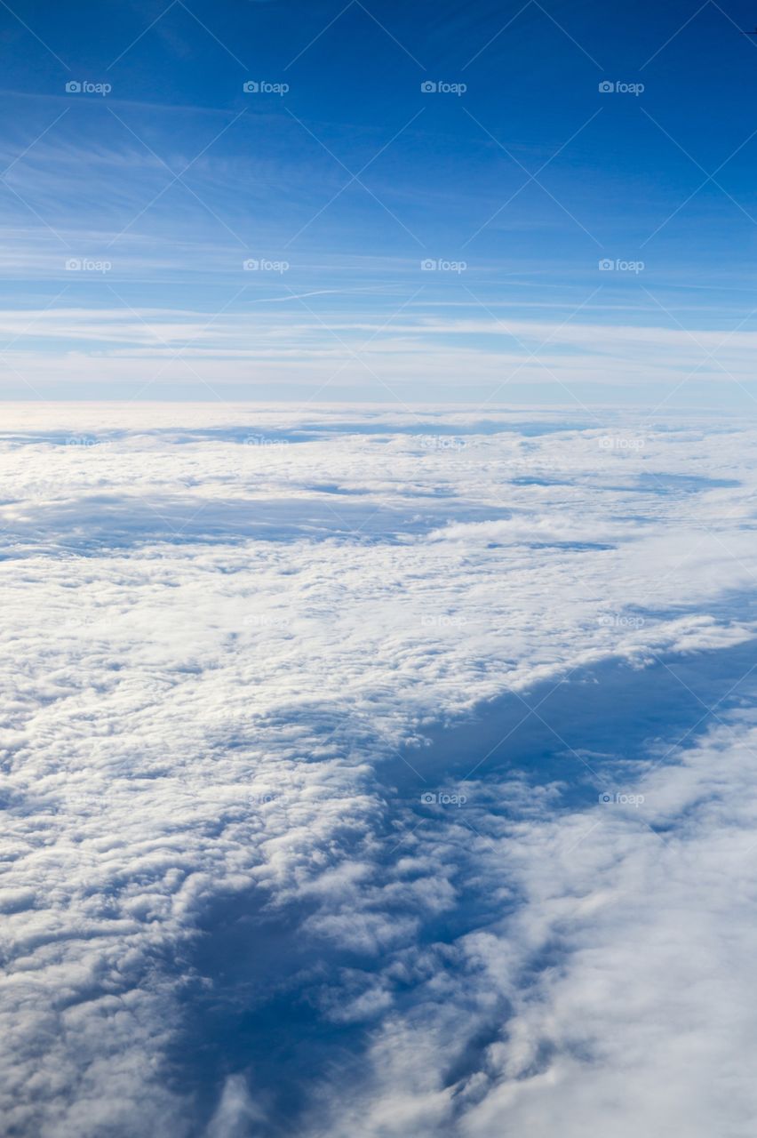 Above the clouds. Photo from the plane.