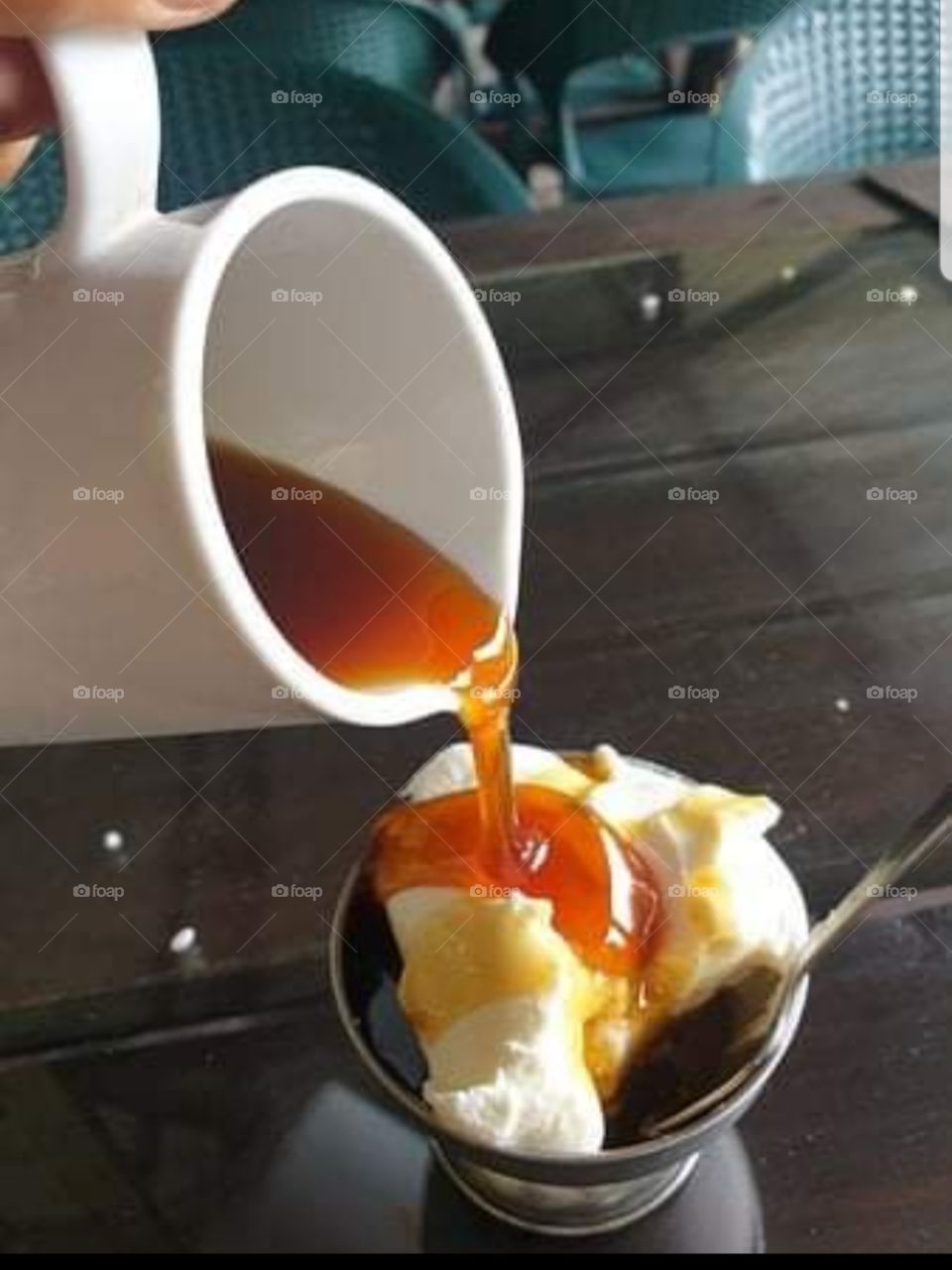 Pouring Honey To Milk Yoghurt