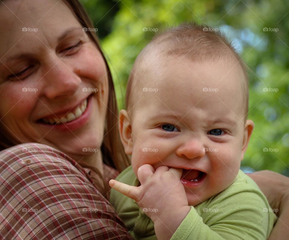 Happy mother with her cute baby