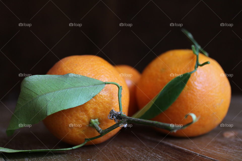 oranges Mandarin on wooden table