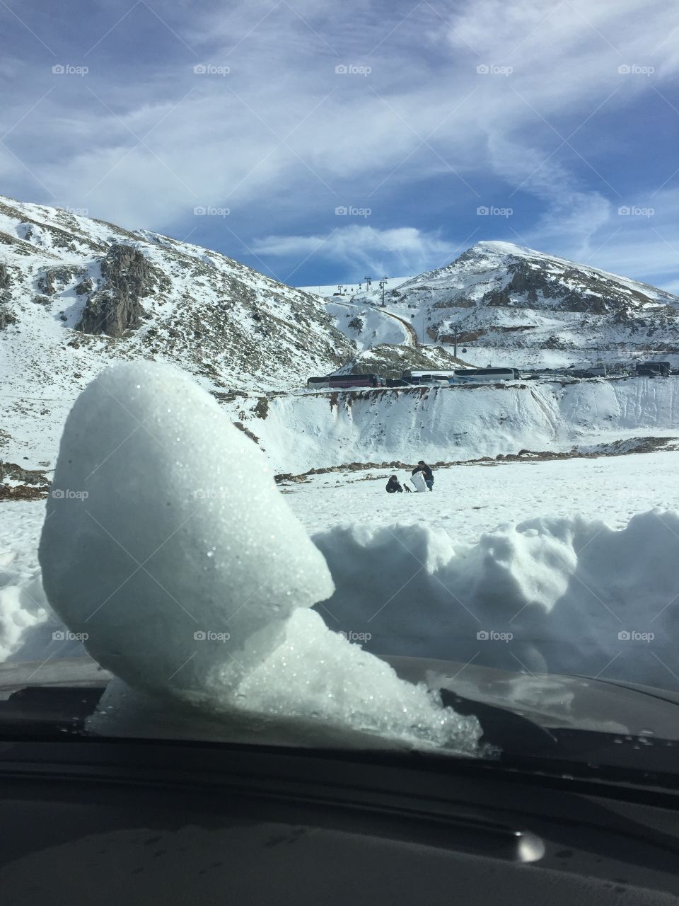 A snowman in a car