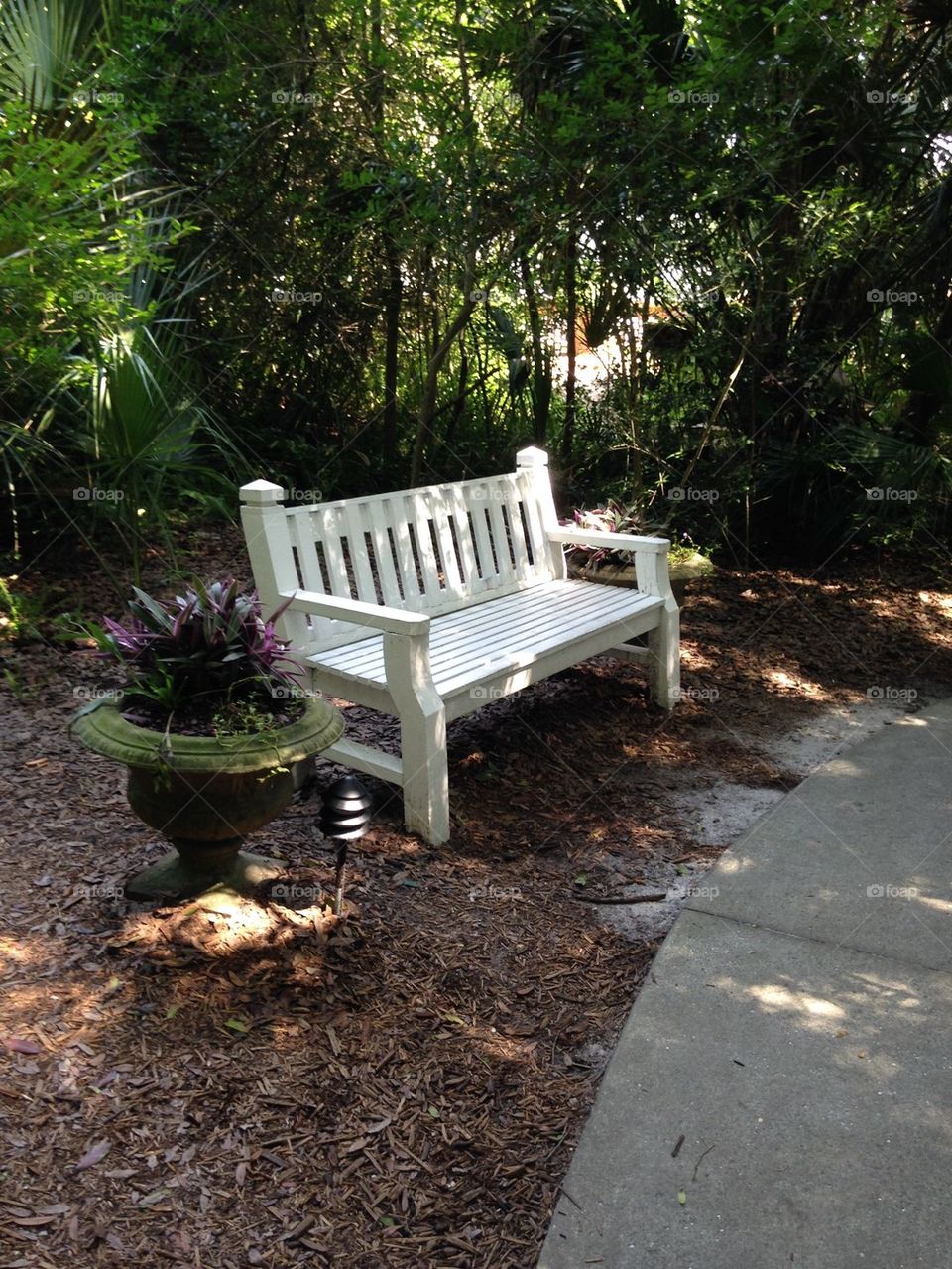 White bench in park