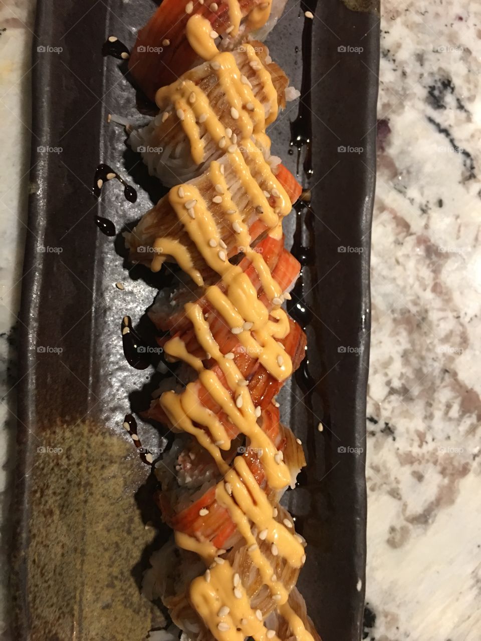 Sushi sundae roll with shrimp tempura and crab mix