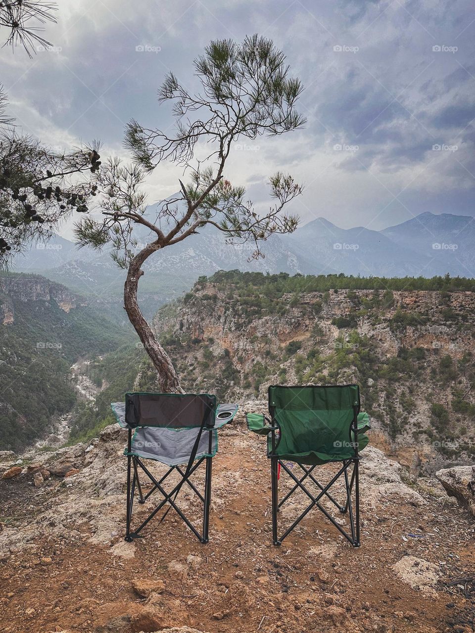 two chairs in the mountains