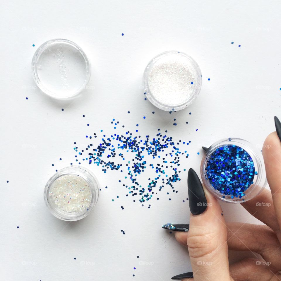 Blue glitter in container