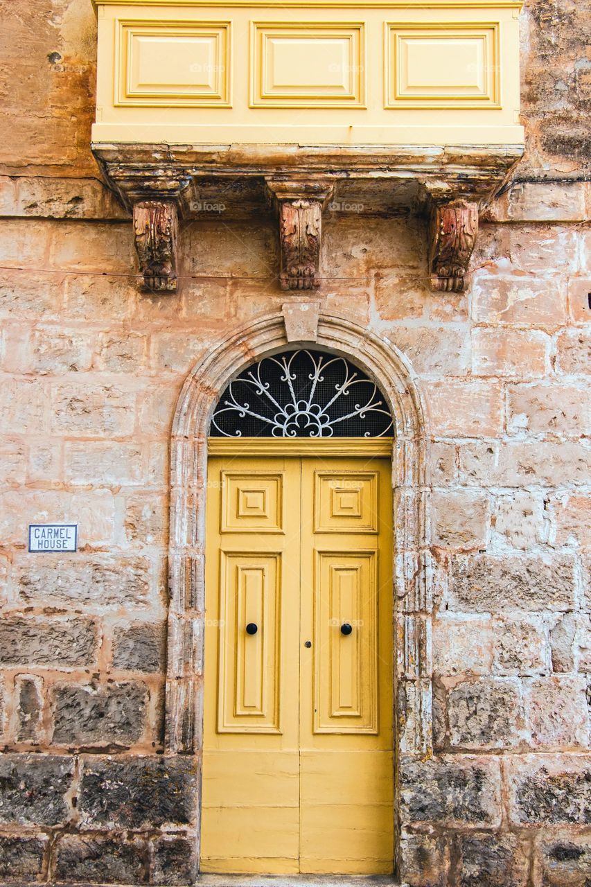 Yellow doorway in Mellieha, Malta