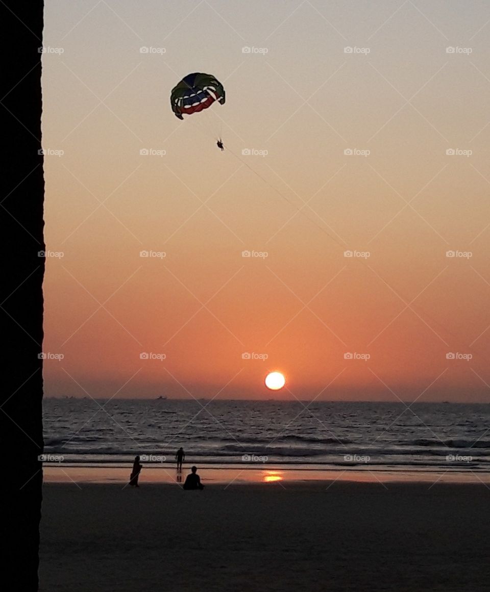 sunset on the beach of Leela Goa