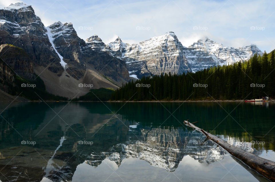 Mountains and landscape reflection at the Moraine Lake