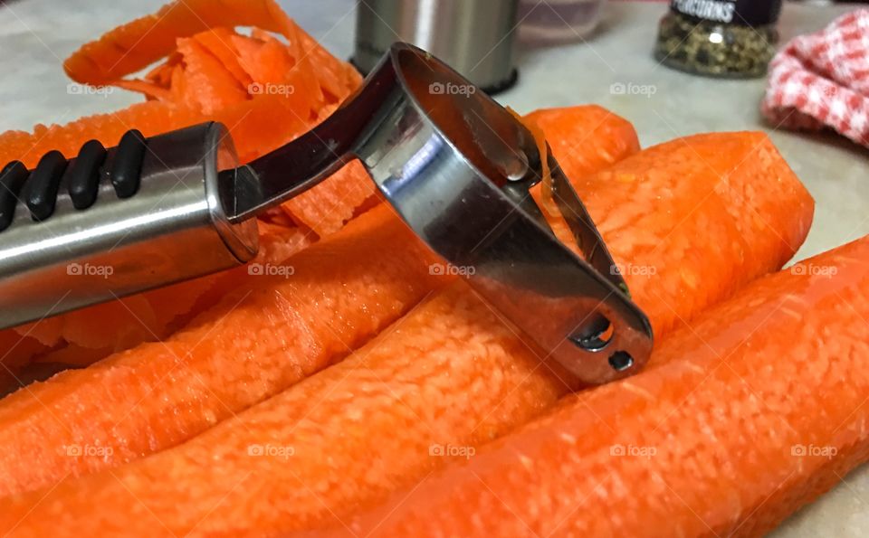 Food prep, peeling carrots 