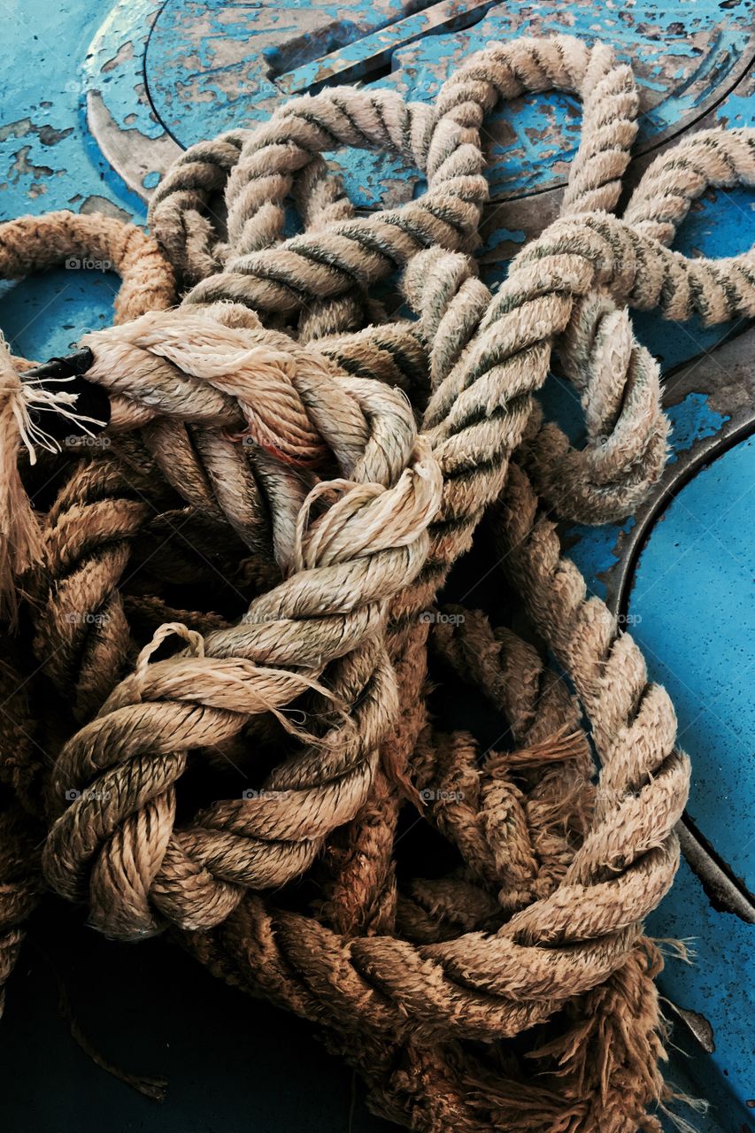 twisted rope on floor of boat