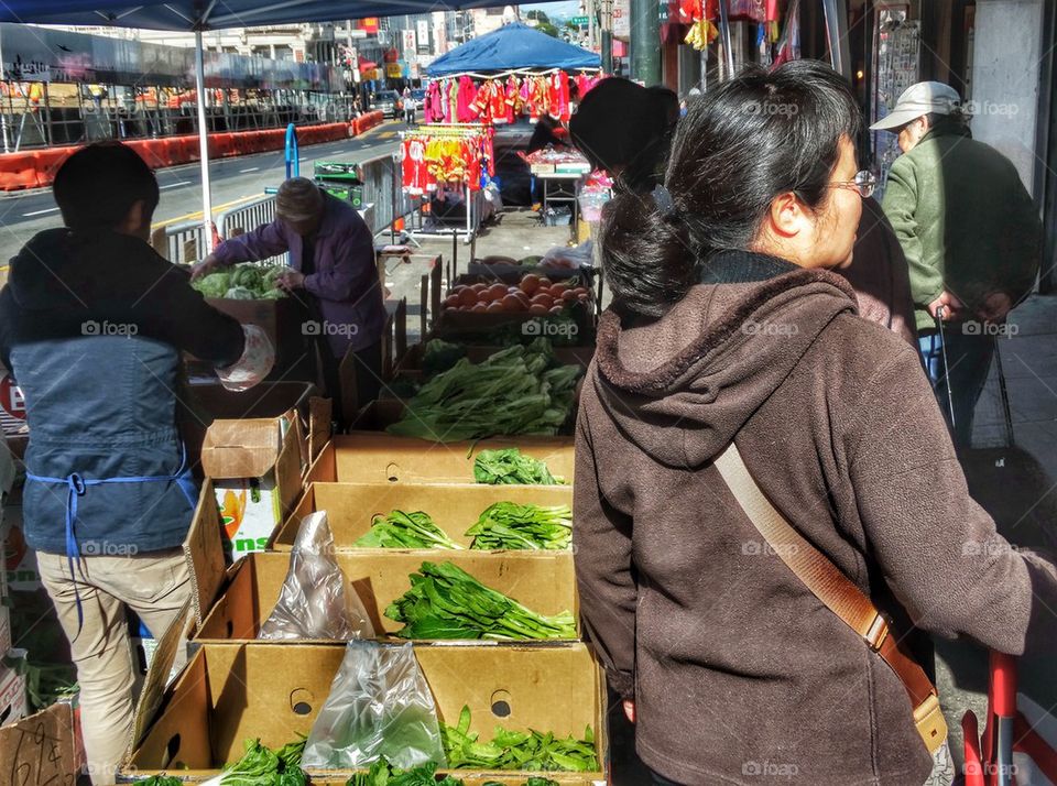 Shopping For Vegetables At A Chinese Street Market. Outdoor Grocery Shopping At A Chinese Market
