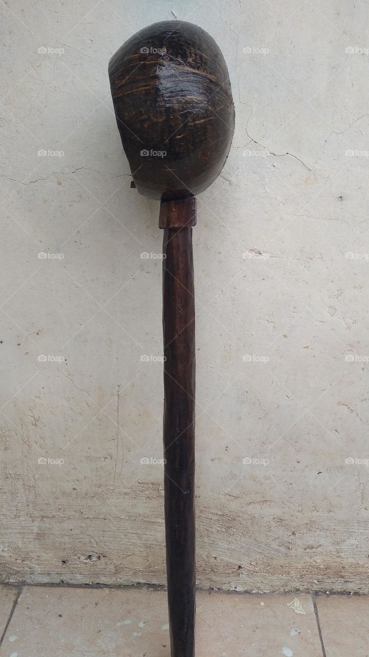 The ancient dipper is made of coconut skin and wood