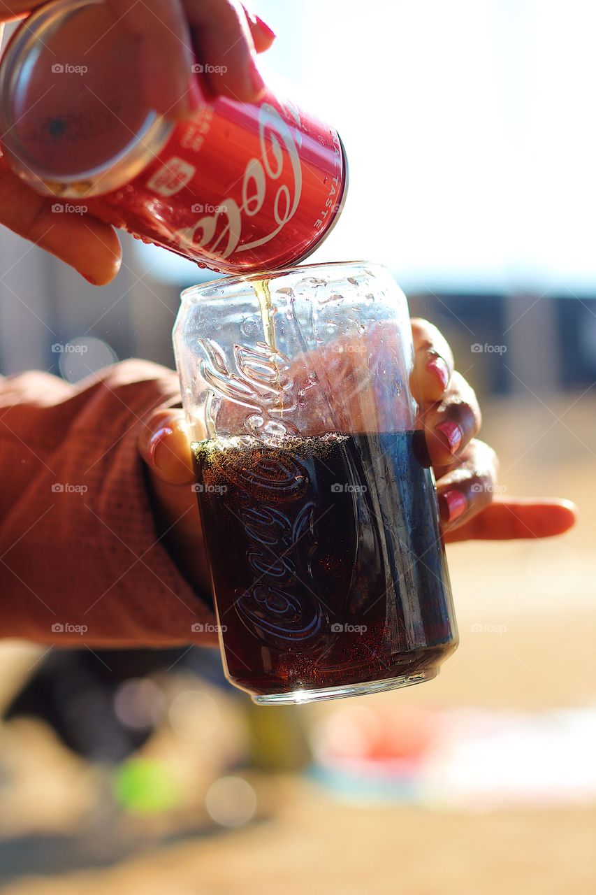 Taste the buzz with Coca Cola 