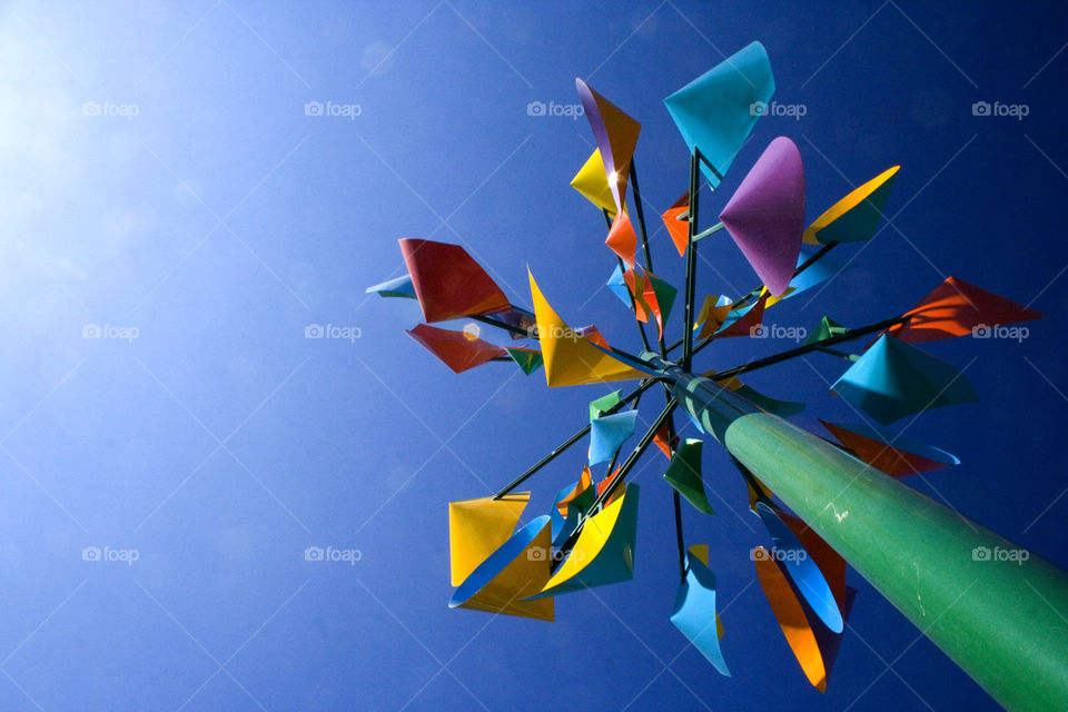 Abstract . An abstract kinetic sculpture against a blue sky
