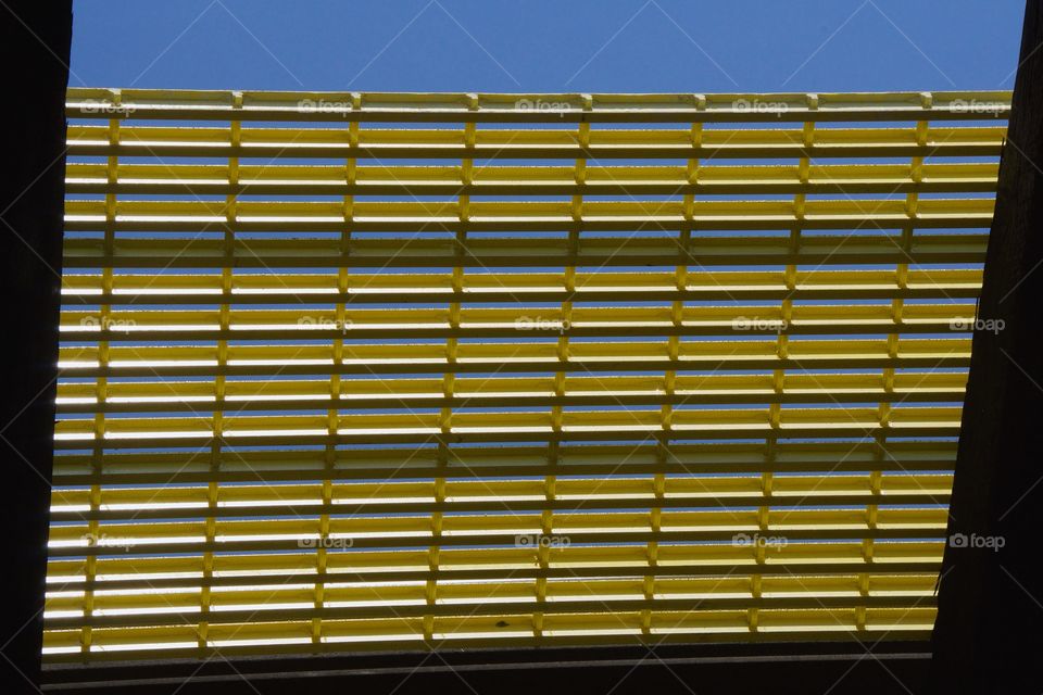 A temporary walkway, as viewed from below an elevated train line being used Tyra just maintenance workers while repairing tracks