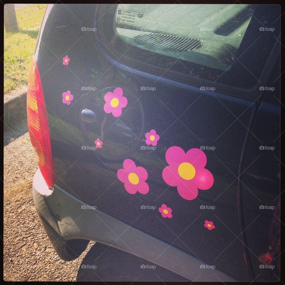 Flower stickers on Corsa car