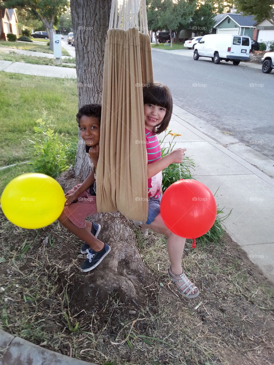 Boy and girl with balloons