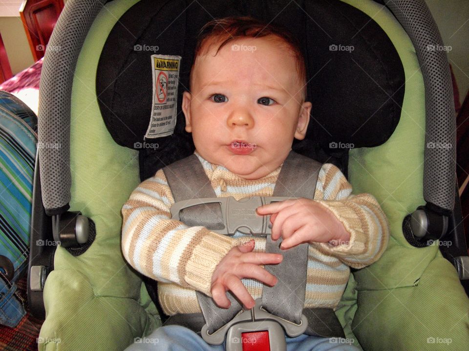 Toddler In A Car Safety Seat
