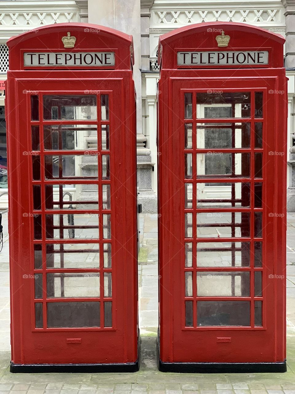 Couple of typical London red telephone boxes 