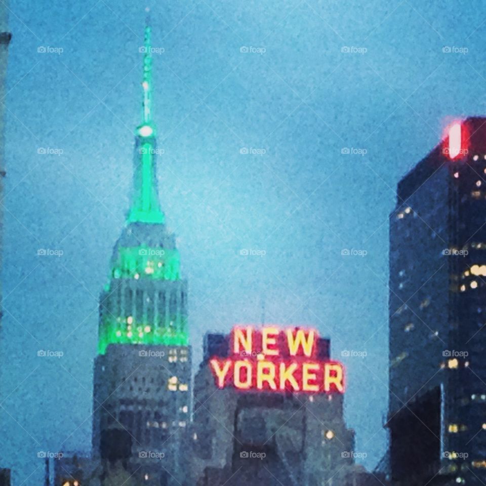 Empire State /New Yorker. Green Empire State Building and The New Yorker. Beautiful evening!